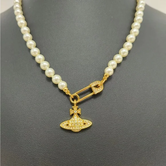Vivienne Westwood Pearl Necklace with Gold Brooch Pendant